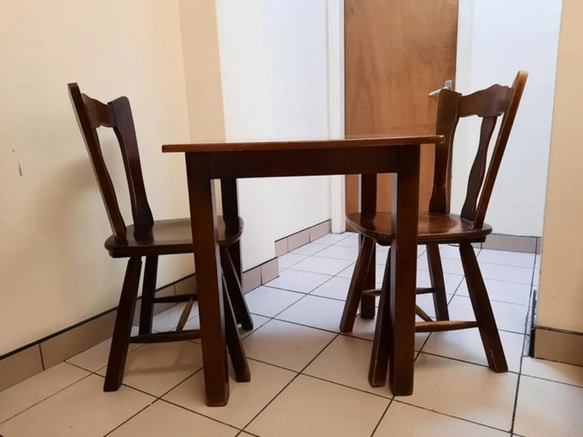Solid wood table and chairs (x12) - Image 1