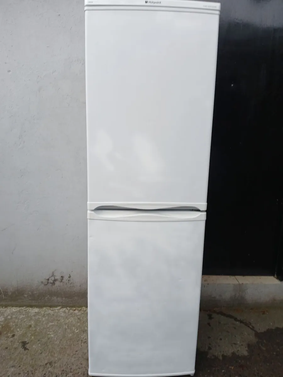A FRIDGE AND FREEZER - Image 1