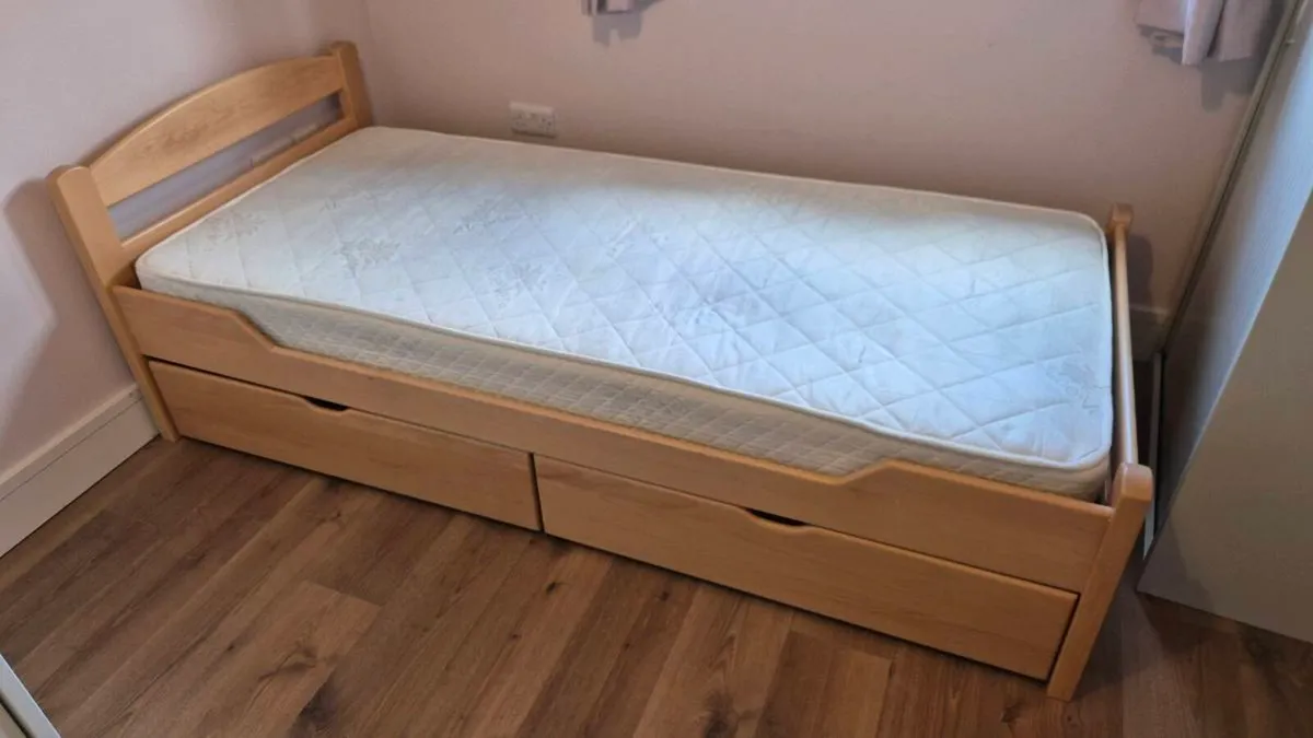 Single wooden bed frame with storage drawers - Image 1