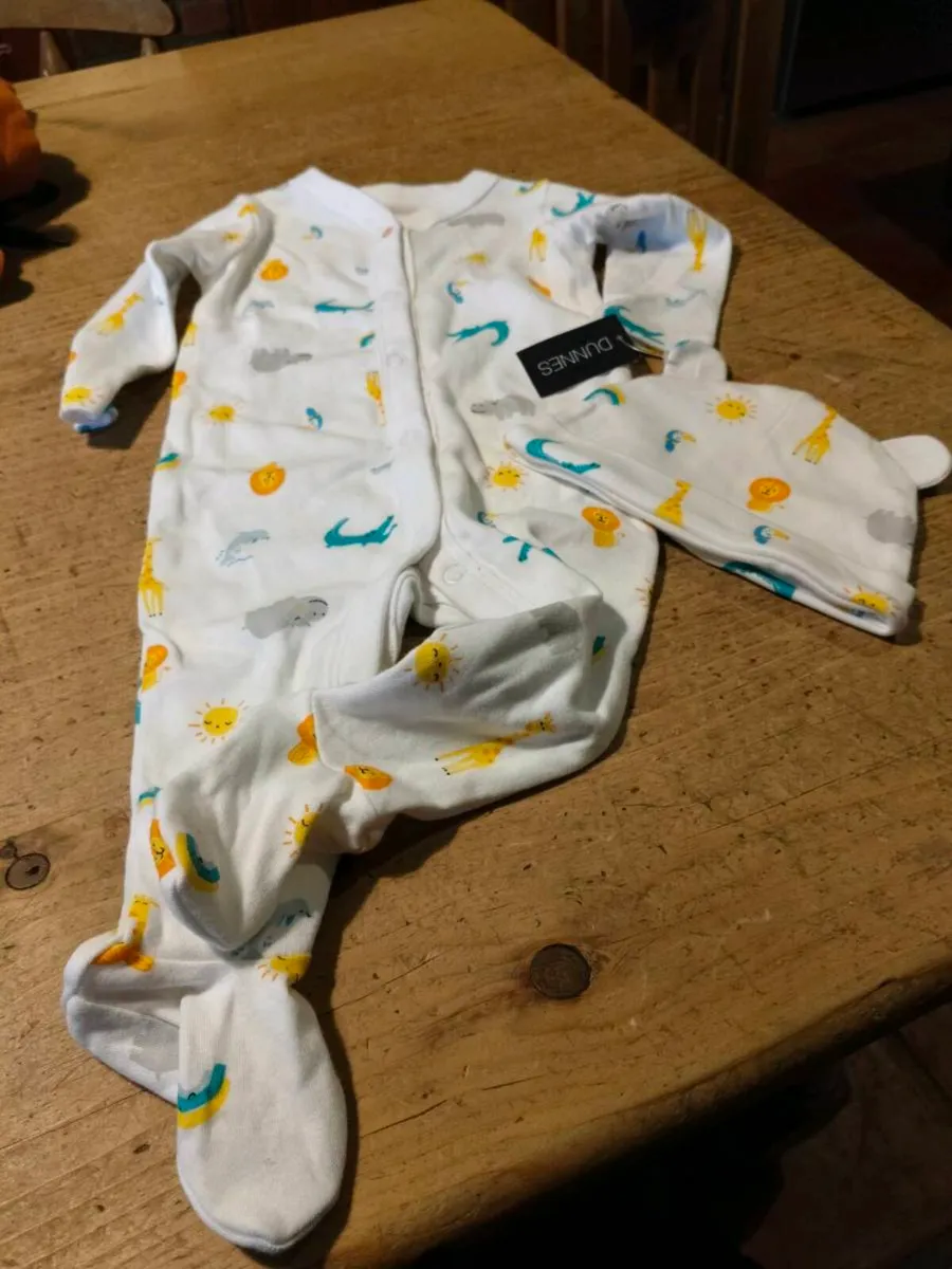 Dunnes Stores baby sleepsuit features an all-over - Image 1
