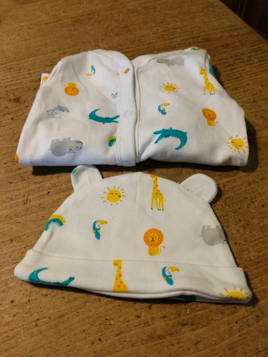 Dunnes Stores baby sleepsuit features an all-over - Image 2