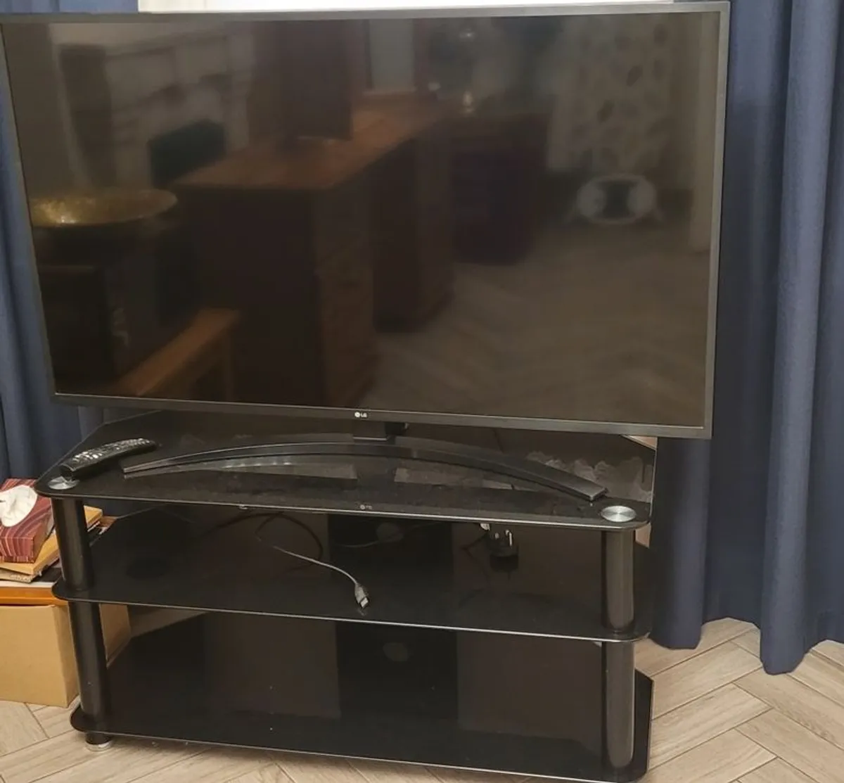 LG 50" TV with TV stand - Image 1