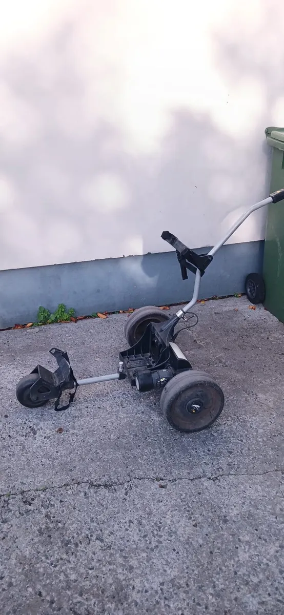 a selection of different golf trolleys - Image 1