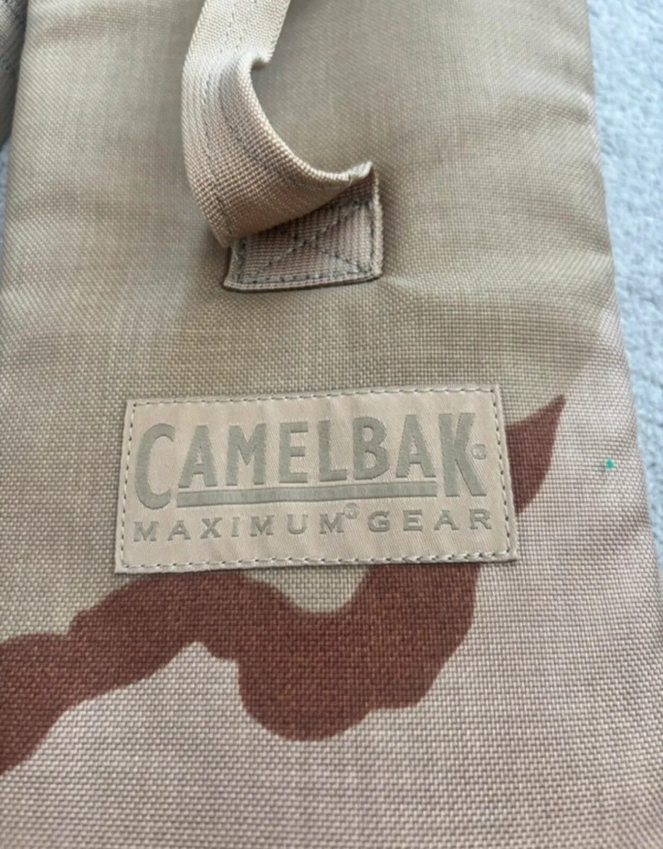 Camelbak maximum gear hydration pack in desert - Image 4