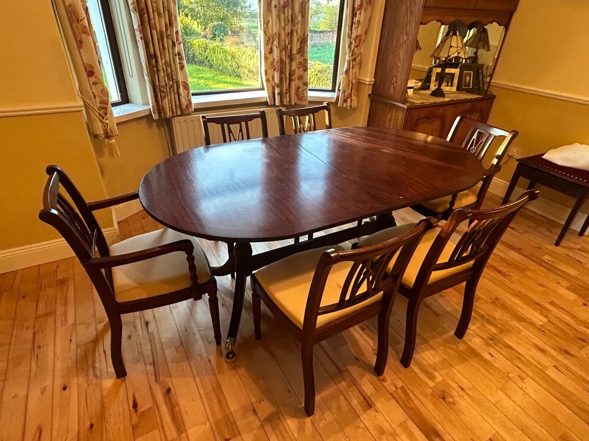 Antique mahogany dining table and chairs - Image 1