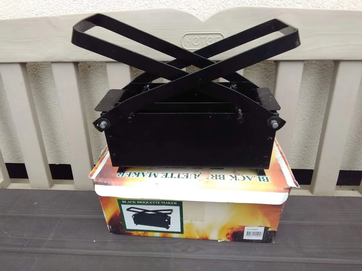Paper briquette maker