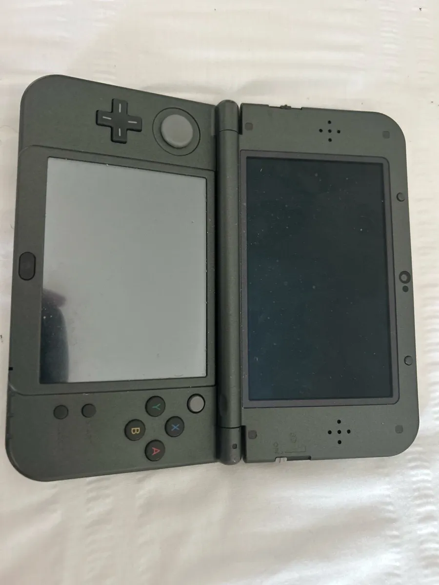 New 3DS XL Black + Pokémon Omega Ruby - Image 1