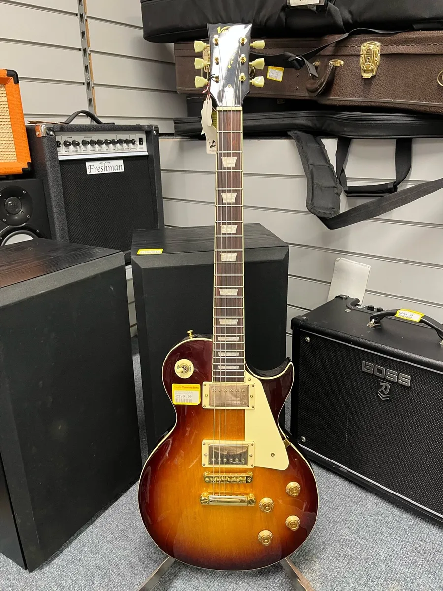 Vintage V100 Tobacco Burst Electric Guitar - Image 1