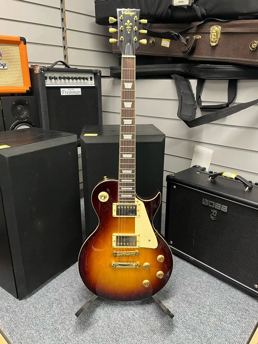 Vintage V100 Sunburst Electric Guitar - Image 1