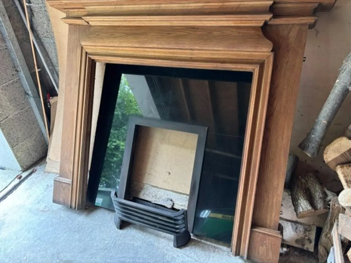 Solid Oak Fireplace with Black Granite Surround - Image 1