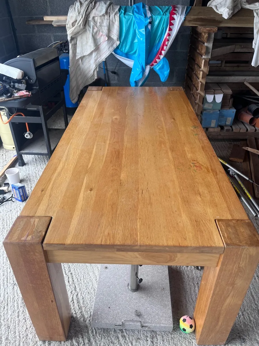 Large solid oak dining table - Image 1