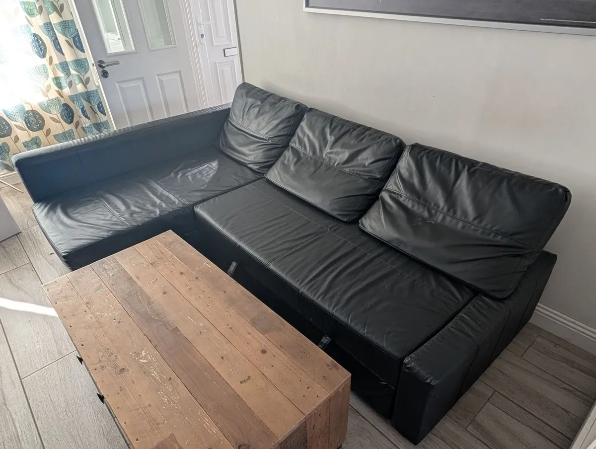 Corner sofa-bed with storage [FRIHETEN]