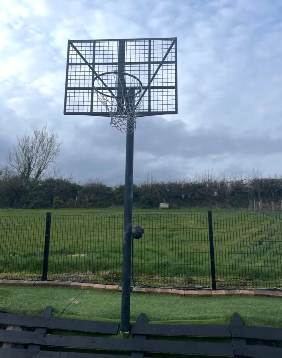 Basketball Ring and Backboard outdoors - Image 1