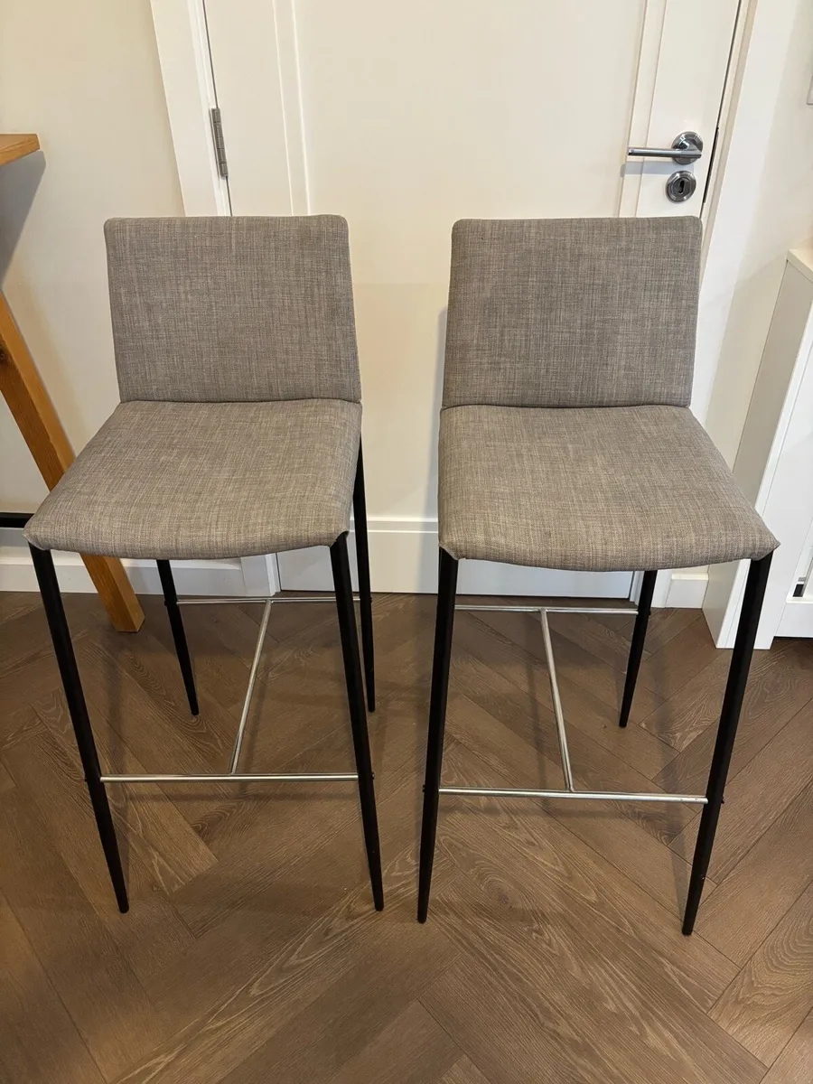 Pair of MADE Grey Fabric Bar Stools – Black Legs - Image 1
