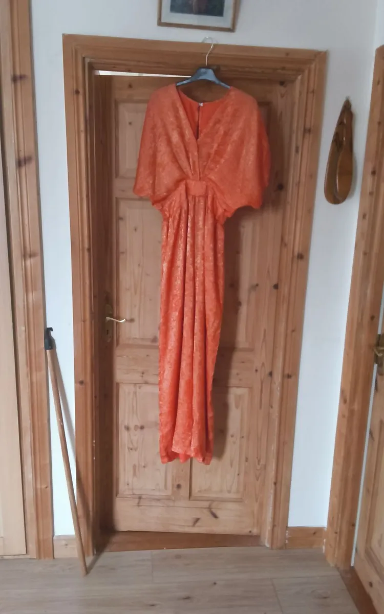 Orange coloured jump suite as new - Image 2