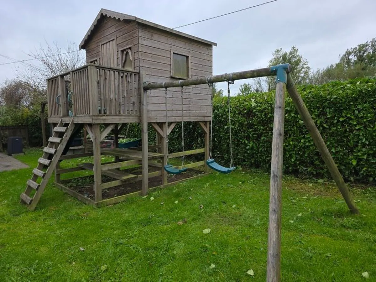 Wooden playhouse with slide and swings - Image 3