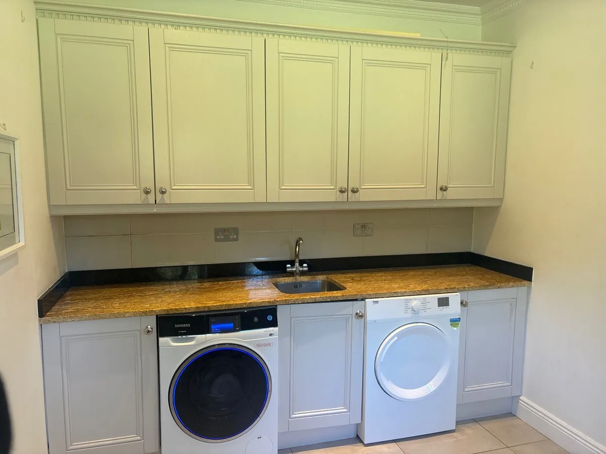 Solid wood kitchen/ utility units and granite top