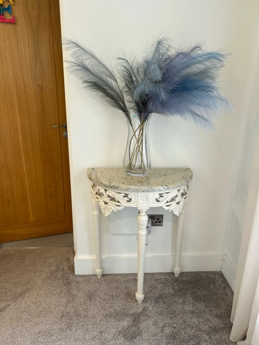 ornate half-moon console table with a granite top - Image 1