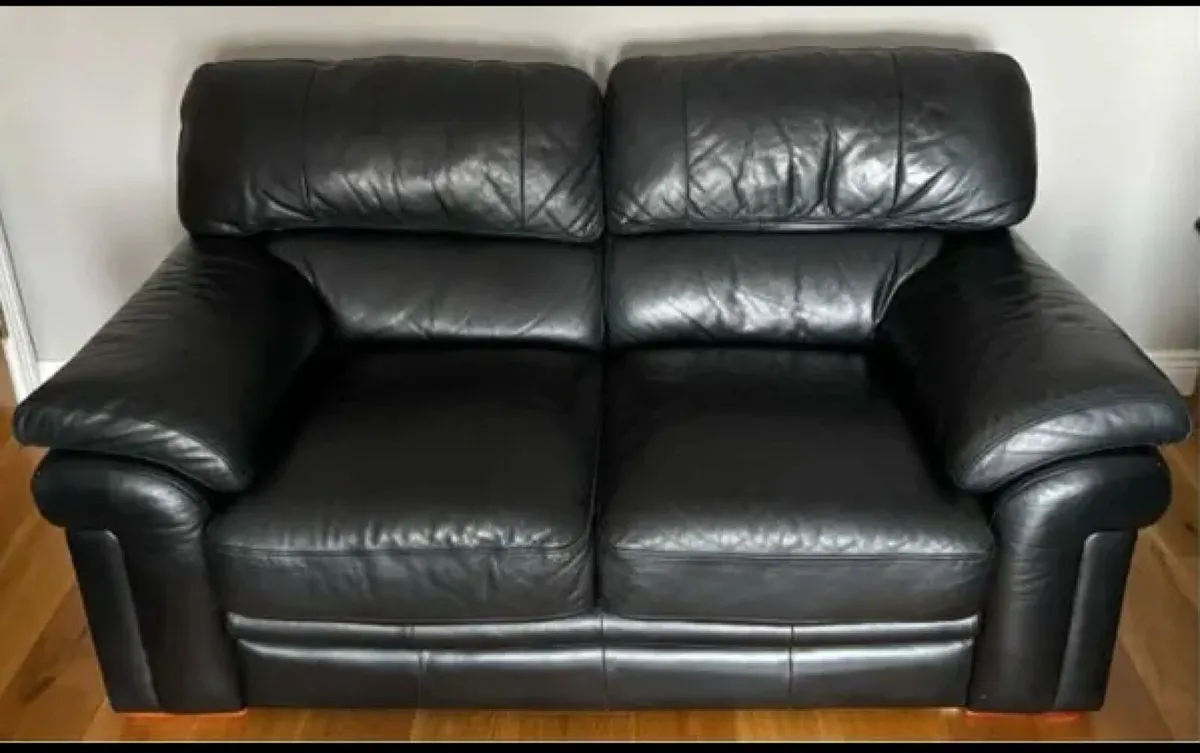 Black two and three seat leather sofa - Image 1