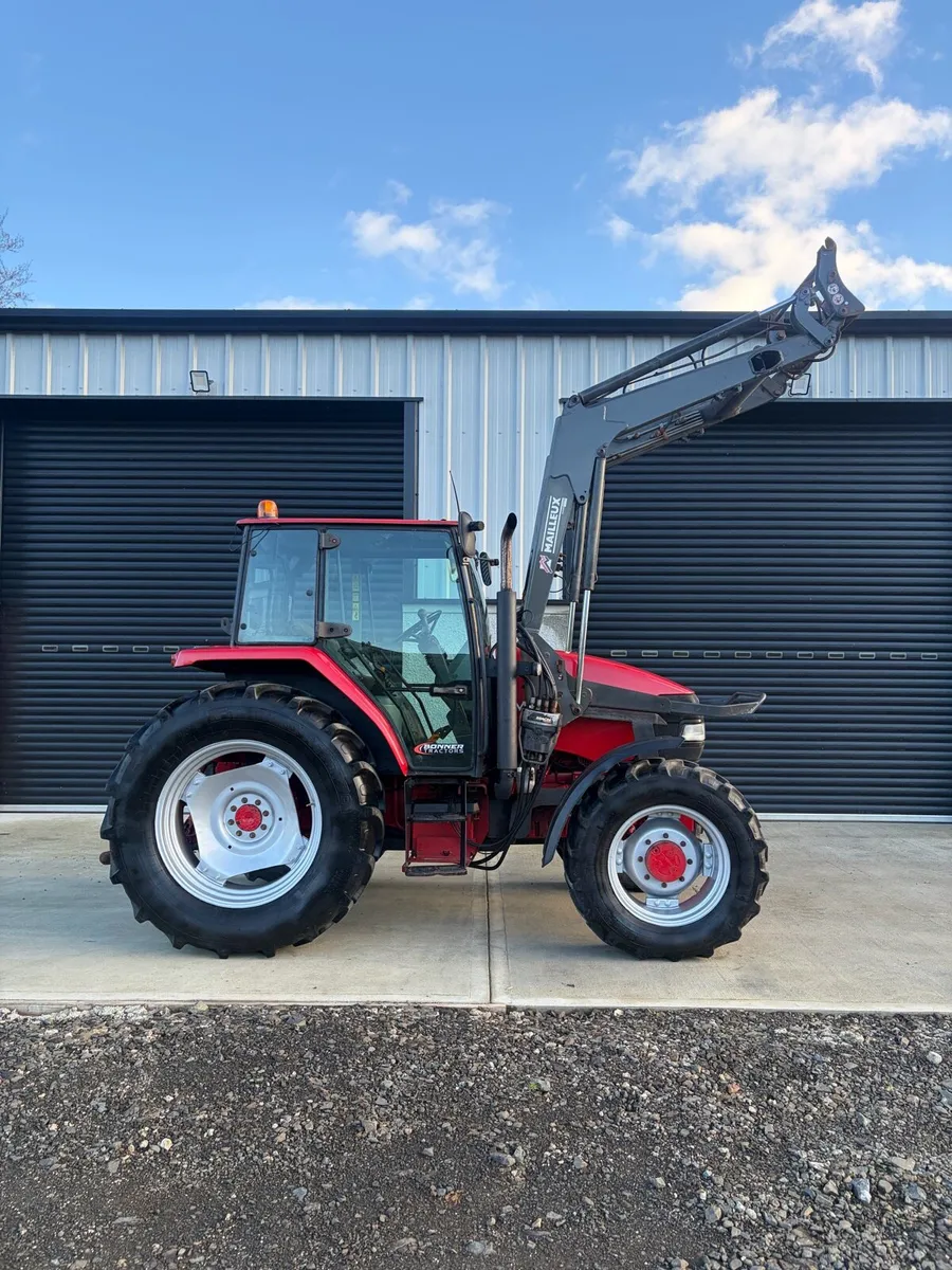 2004 McCormick cx95 & loader - Image 1