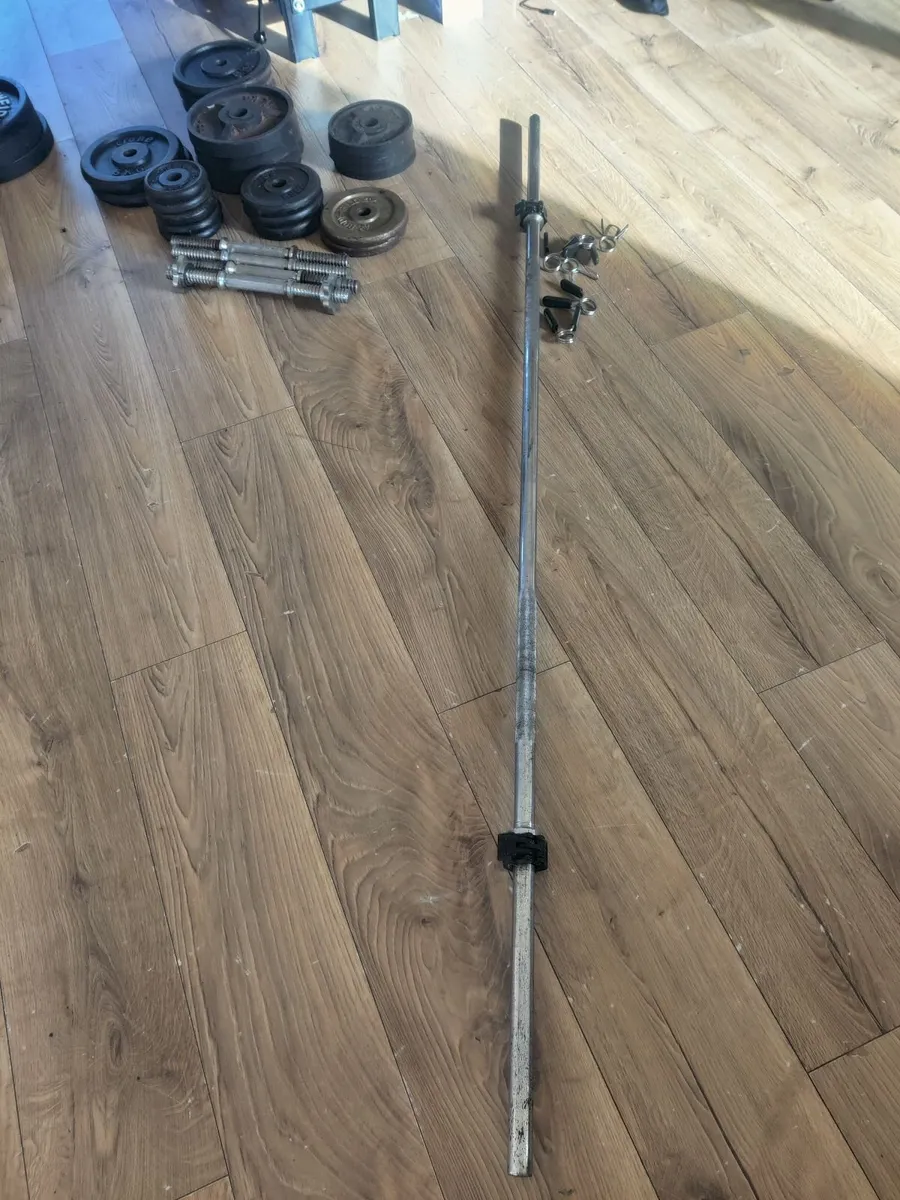 Exercise equipment weights and bar - Image 1