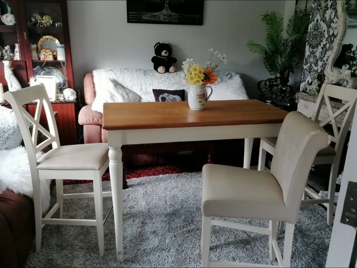 Bar style table and 3 chairs