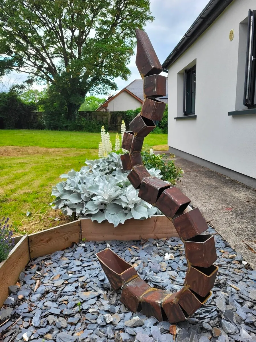Rustic outdoor sculpture - Image 2