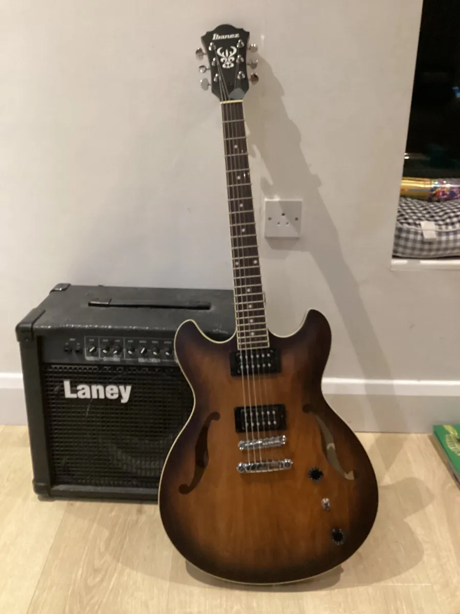 Electric guitar + amp. - Image 1