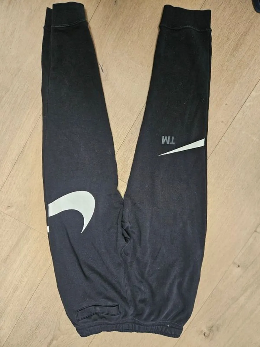 Boys XL Nike tracksuit bottoms - Image 1