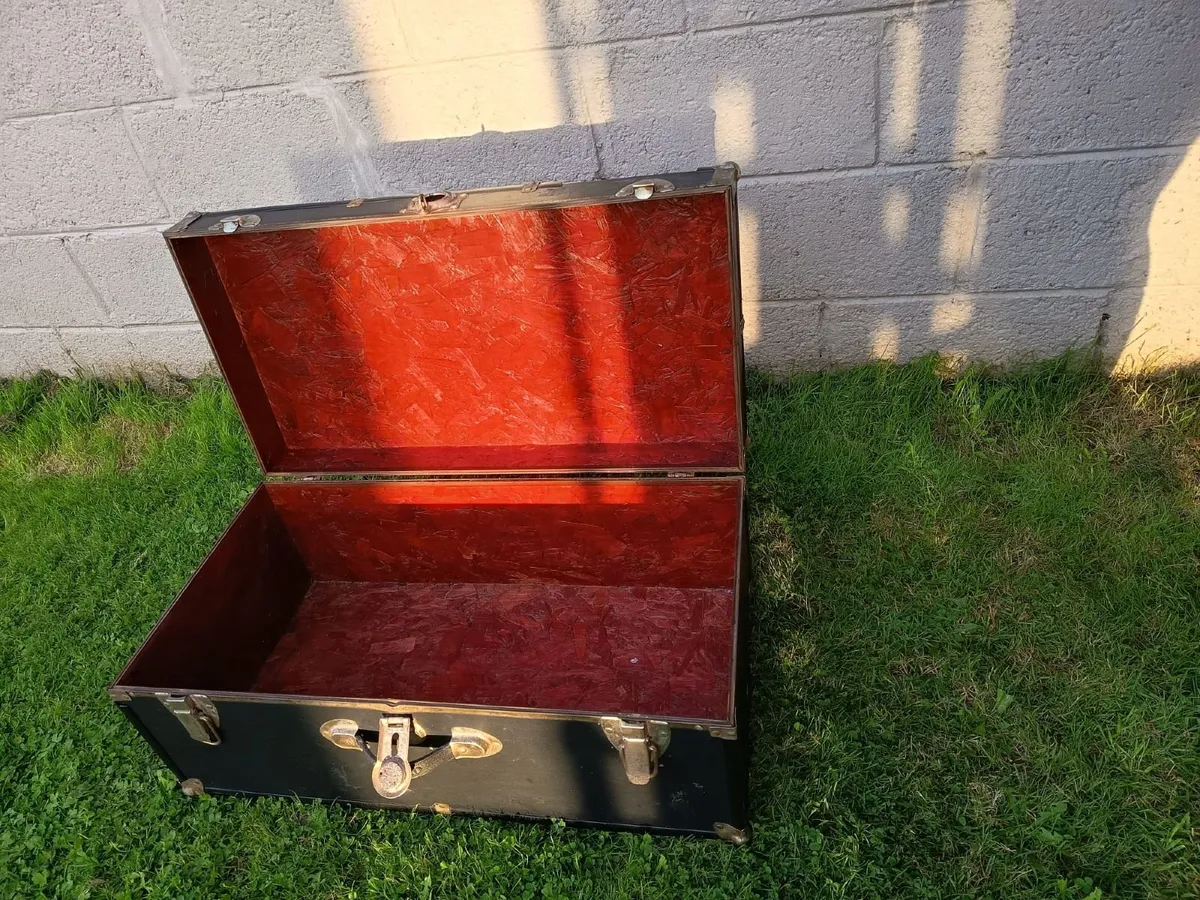 Black storage trunk with red patterned lining - Image 2