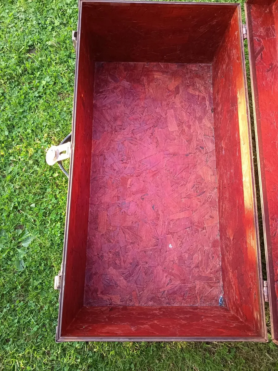 Black storage trunk with red patterned lining - Image 3