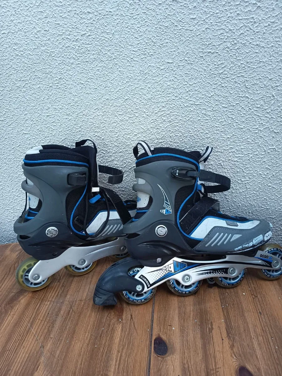 Grey and blue inline skates - Image 1