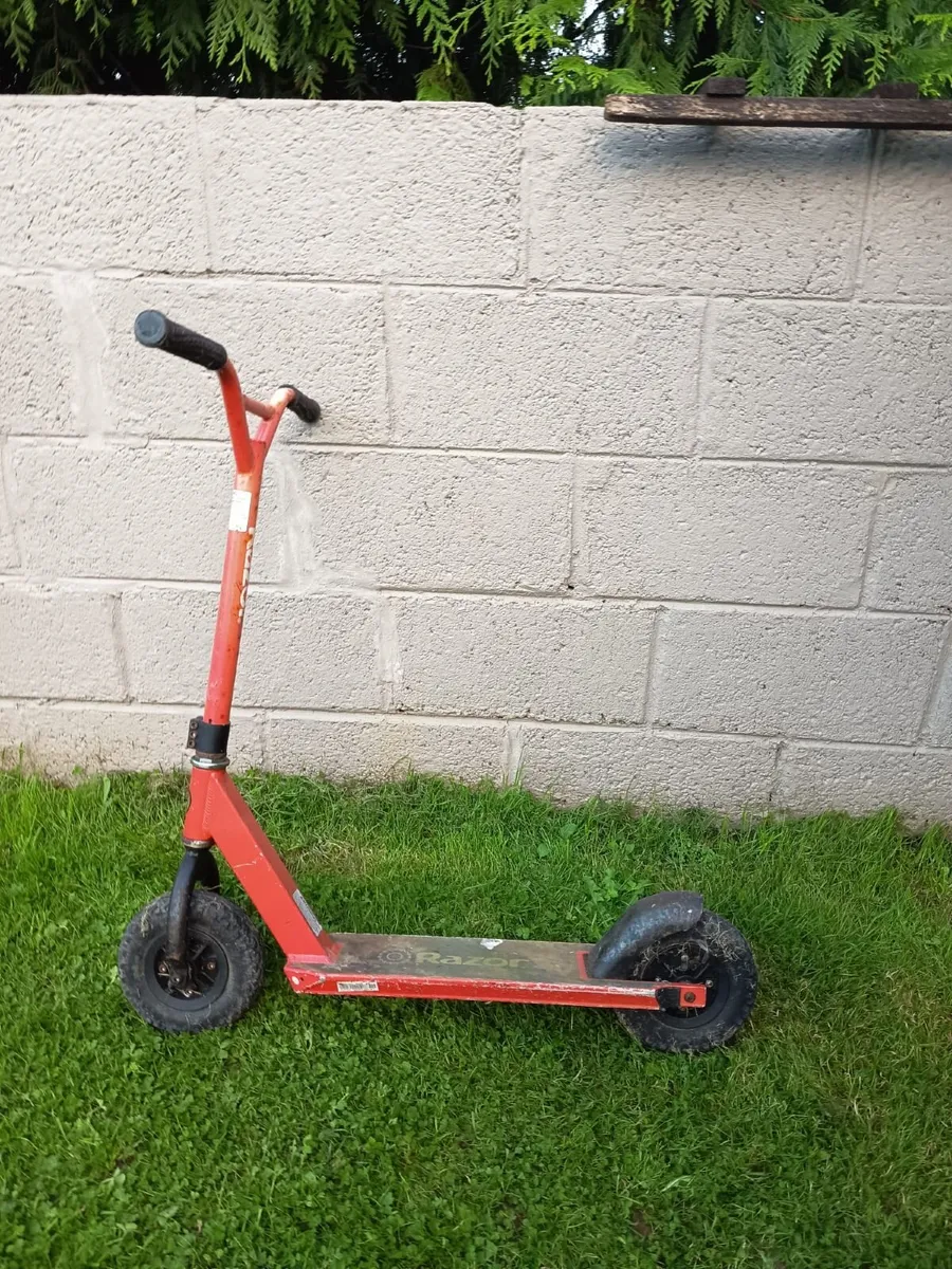 Red Razor off-road scooter - Image 1