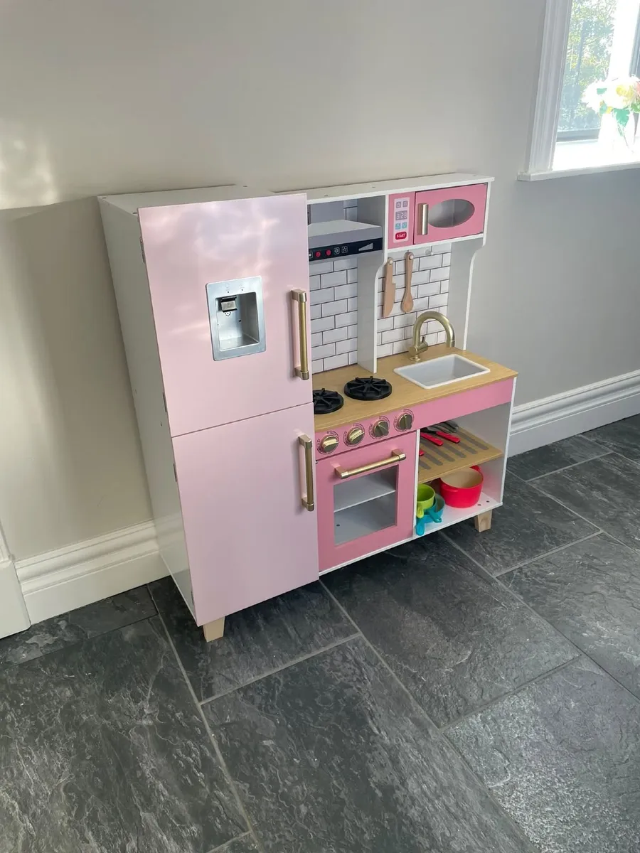 Pink Wooden Kitchen - Image 1