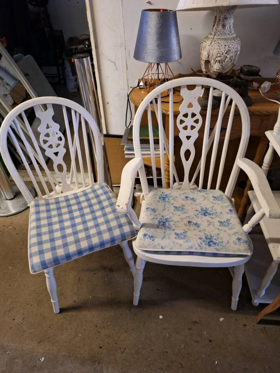 Two vintage white chairs