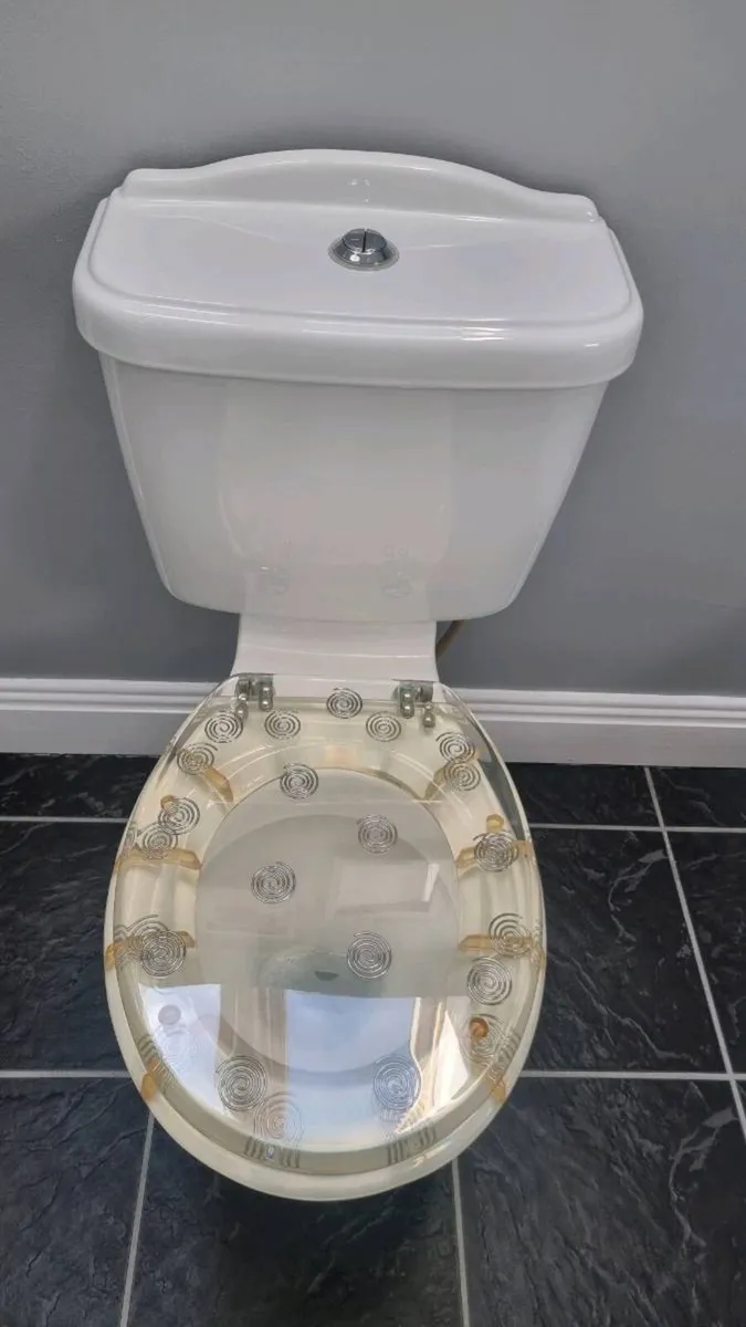 White toilet - Image 1