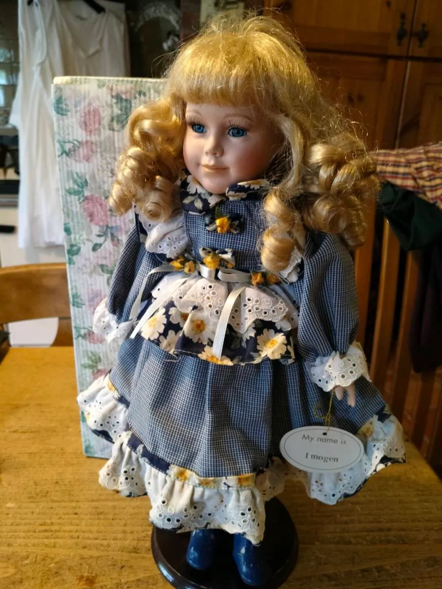 This Leonardo Collectors porcelain doll features r - Image 1