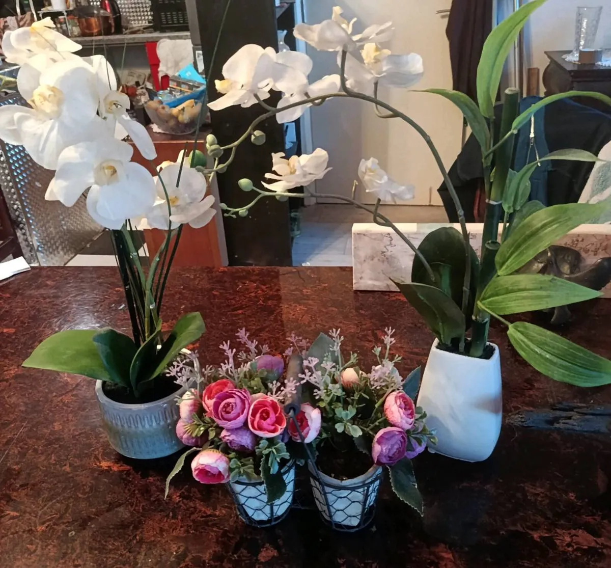 3 artificial potted flowers
