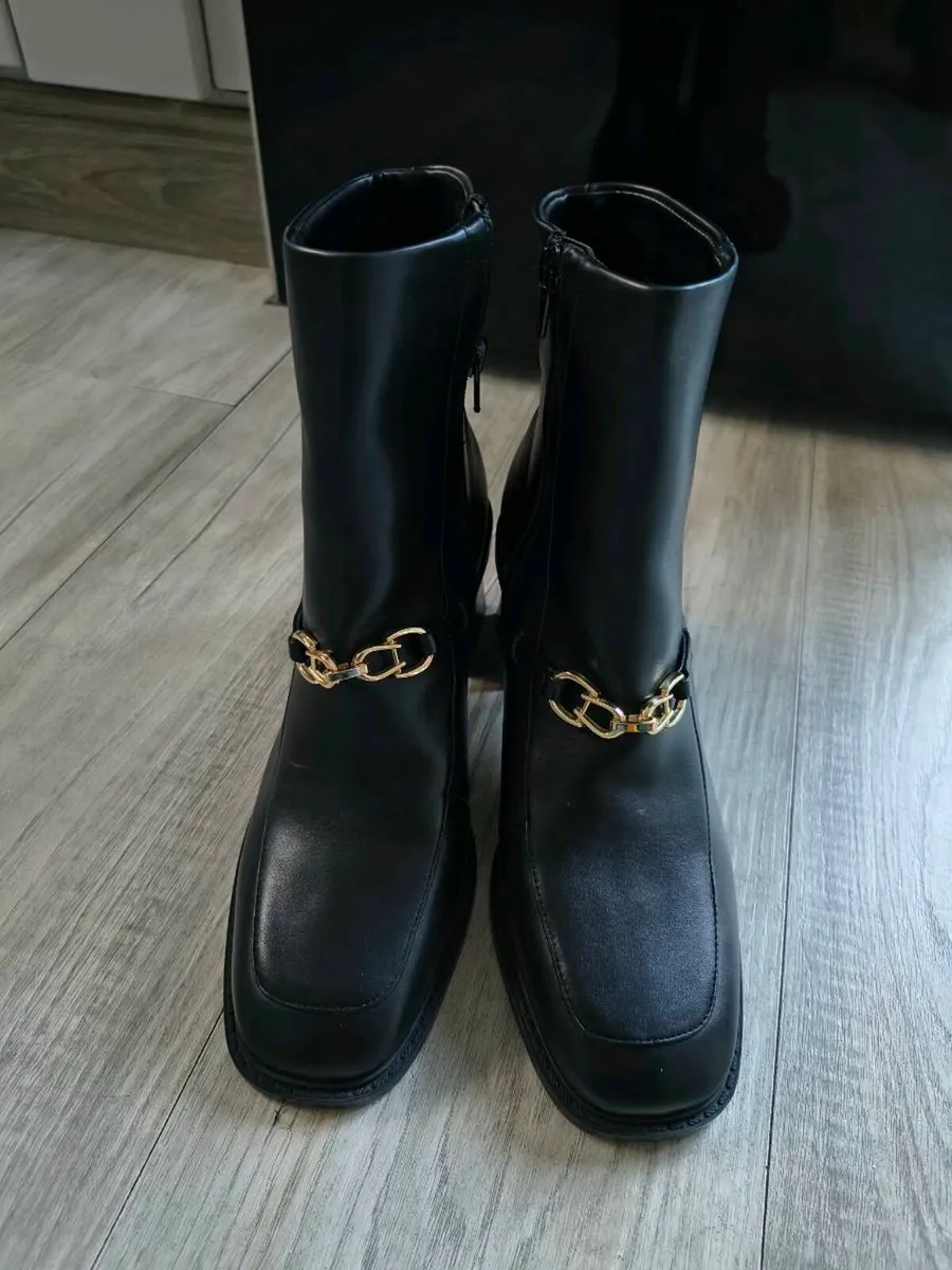 Rita Ora black boots - Image 1