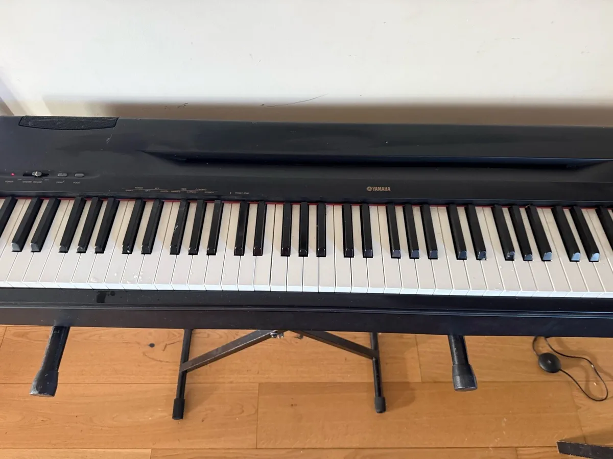 Yamaha piano and stand - Image 1