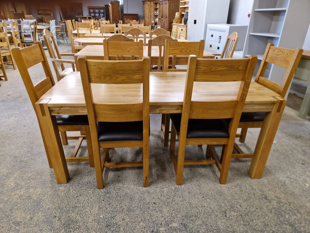 Solid oak table, 6 oak ladder back chairs - Image 1