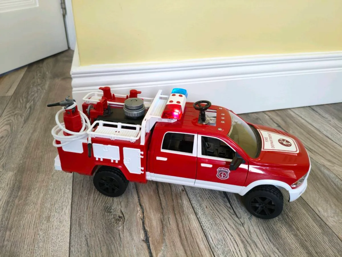 Bruder RAM 2500 Large Light and Sounds Fire truck - Image 1