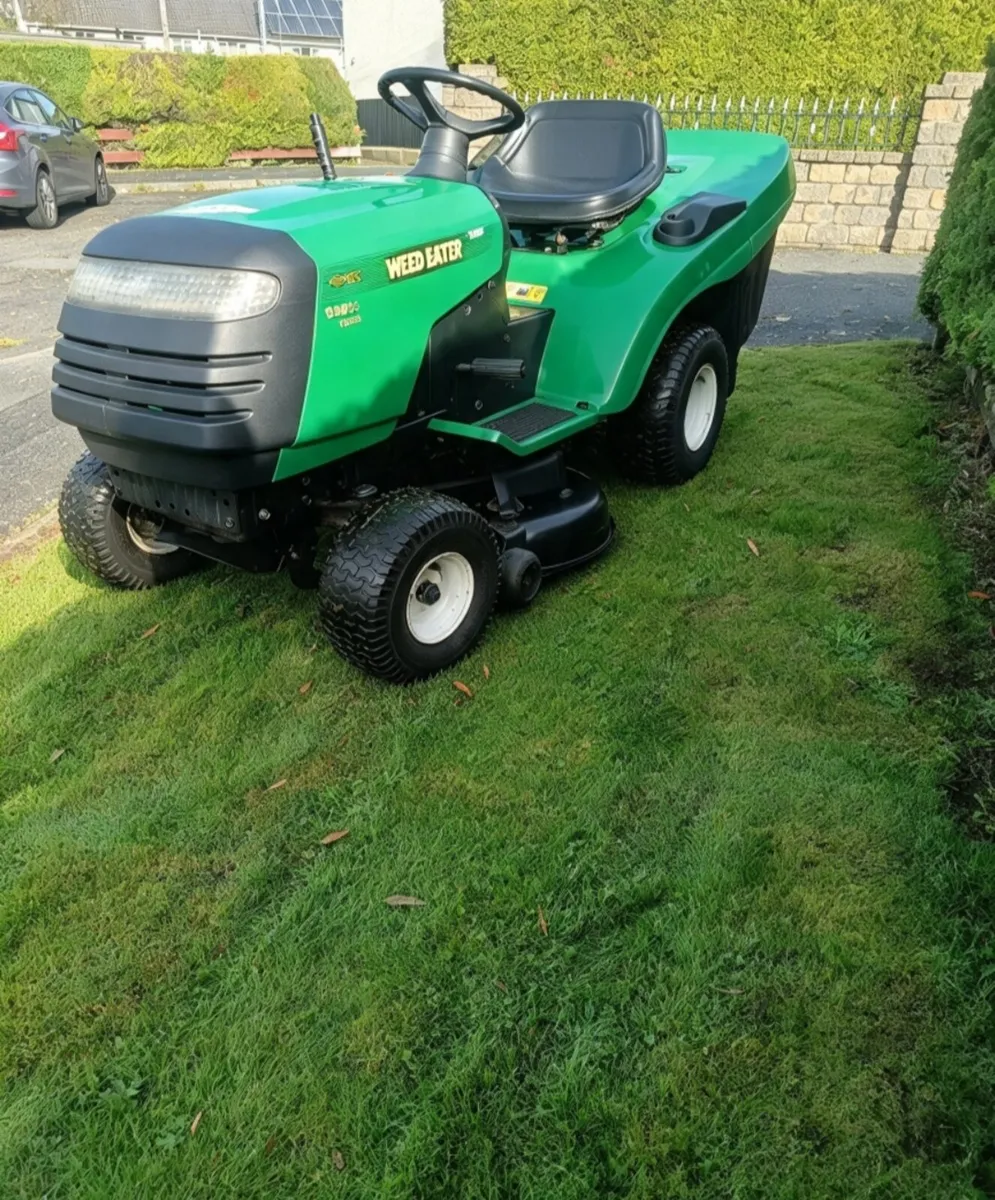 Weed eater made by husquvarna petrol ride on lawnm - Image 3