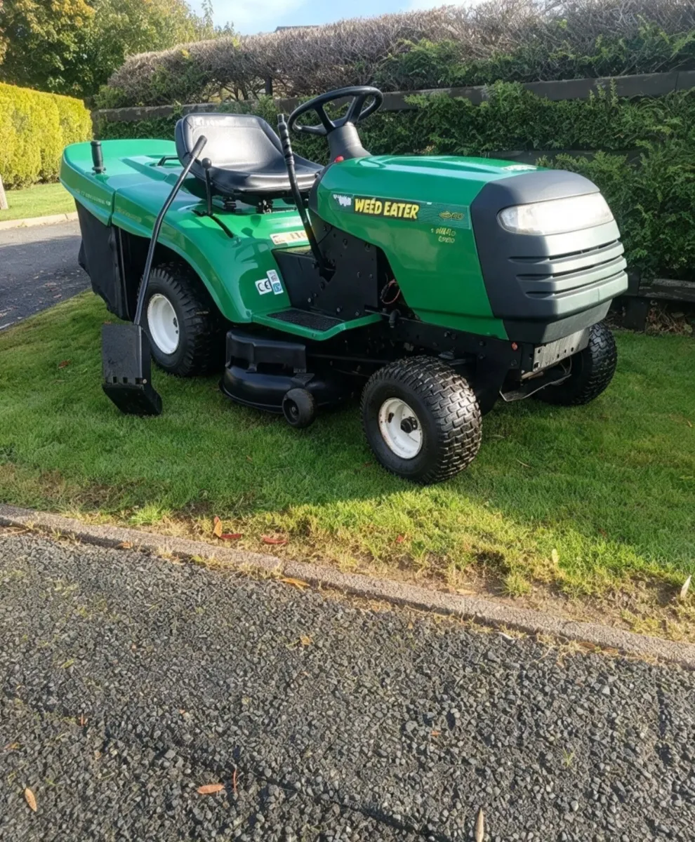 Weed eater made by husquvarna petrol ride on lawnm - Image 1