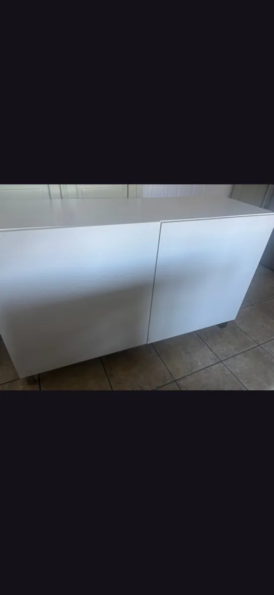 TV stand with a storage space and a sofa - Image 1