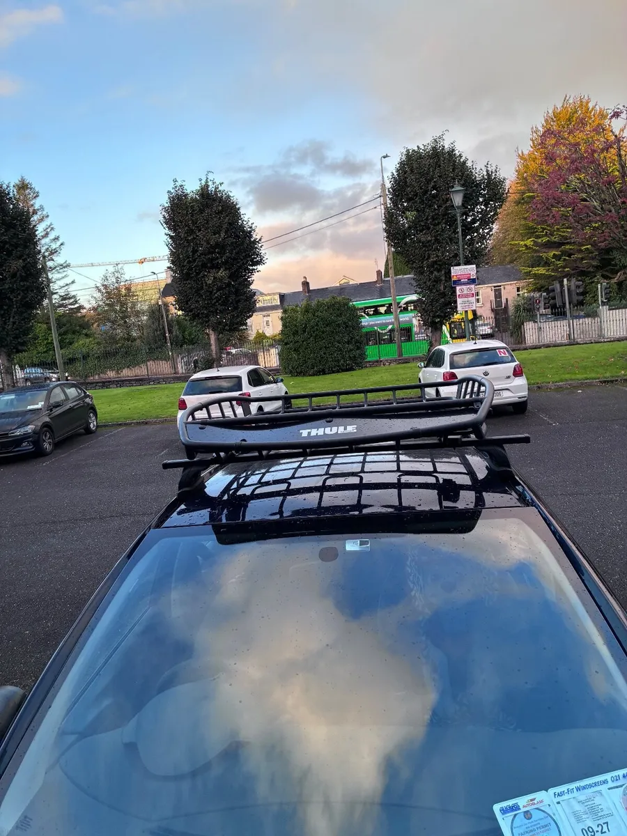 Thule cross bars and Canyon XT basket - Image 1