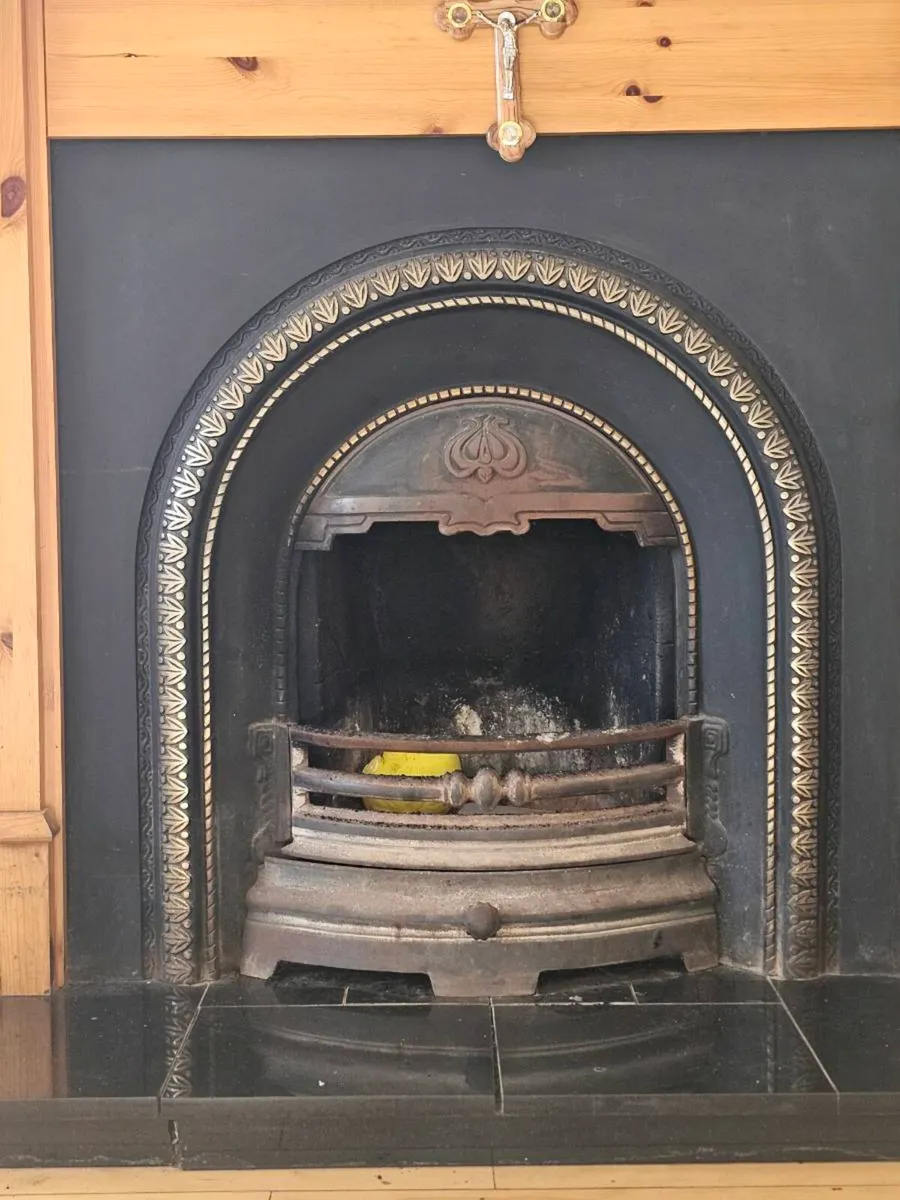 Classic wooden and cast-iron fireplace - Image 1
