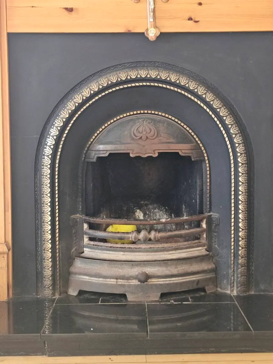 Classic wooden and cast-iron fireplace - Image 2