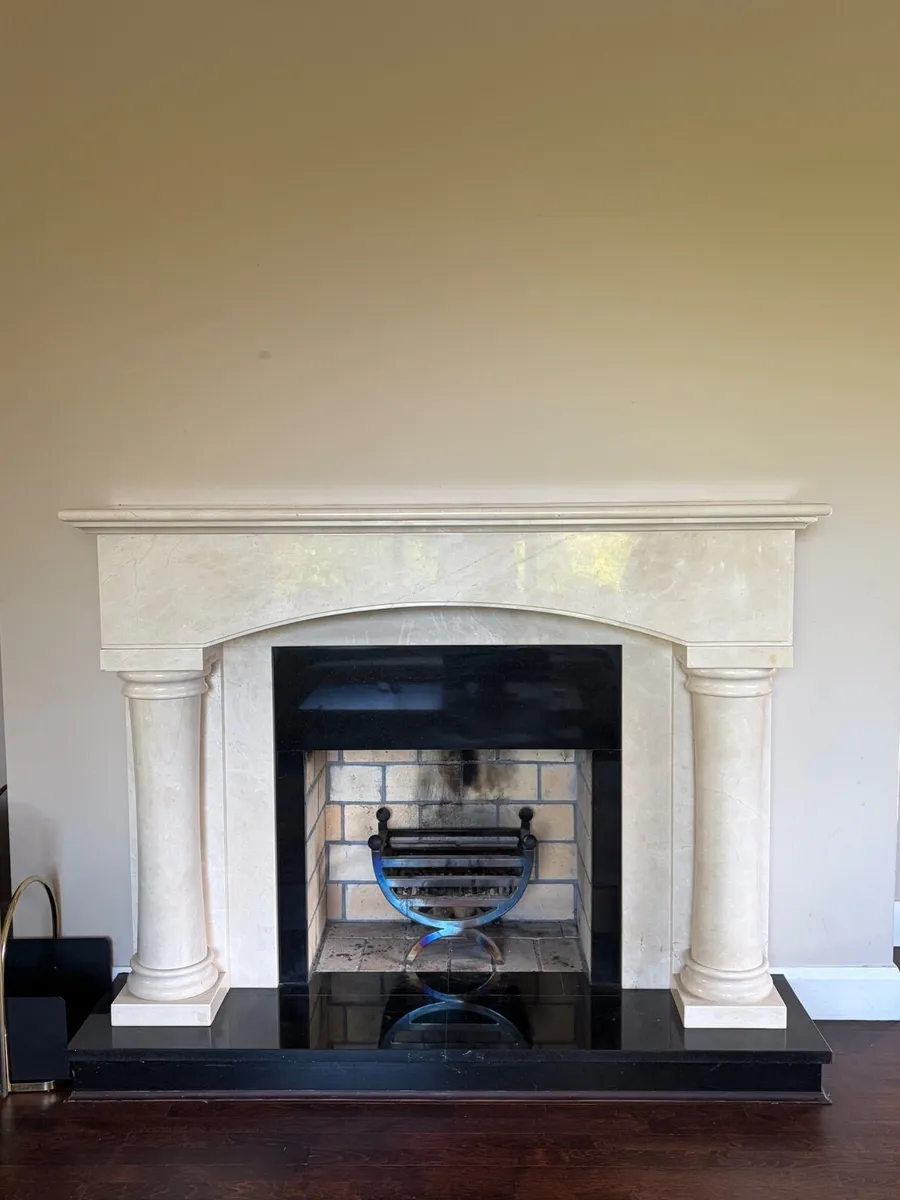 Elegant Marble Fireplace Surround with Pillars