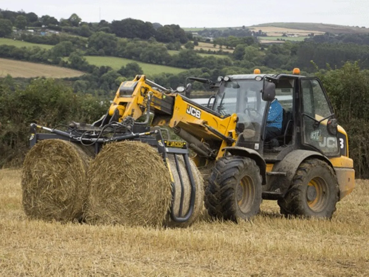 Unused Fleming Double Bale Handler - Squeeze Hands - Image 1